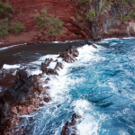 red sand pocket beach
